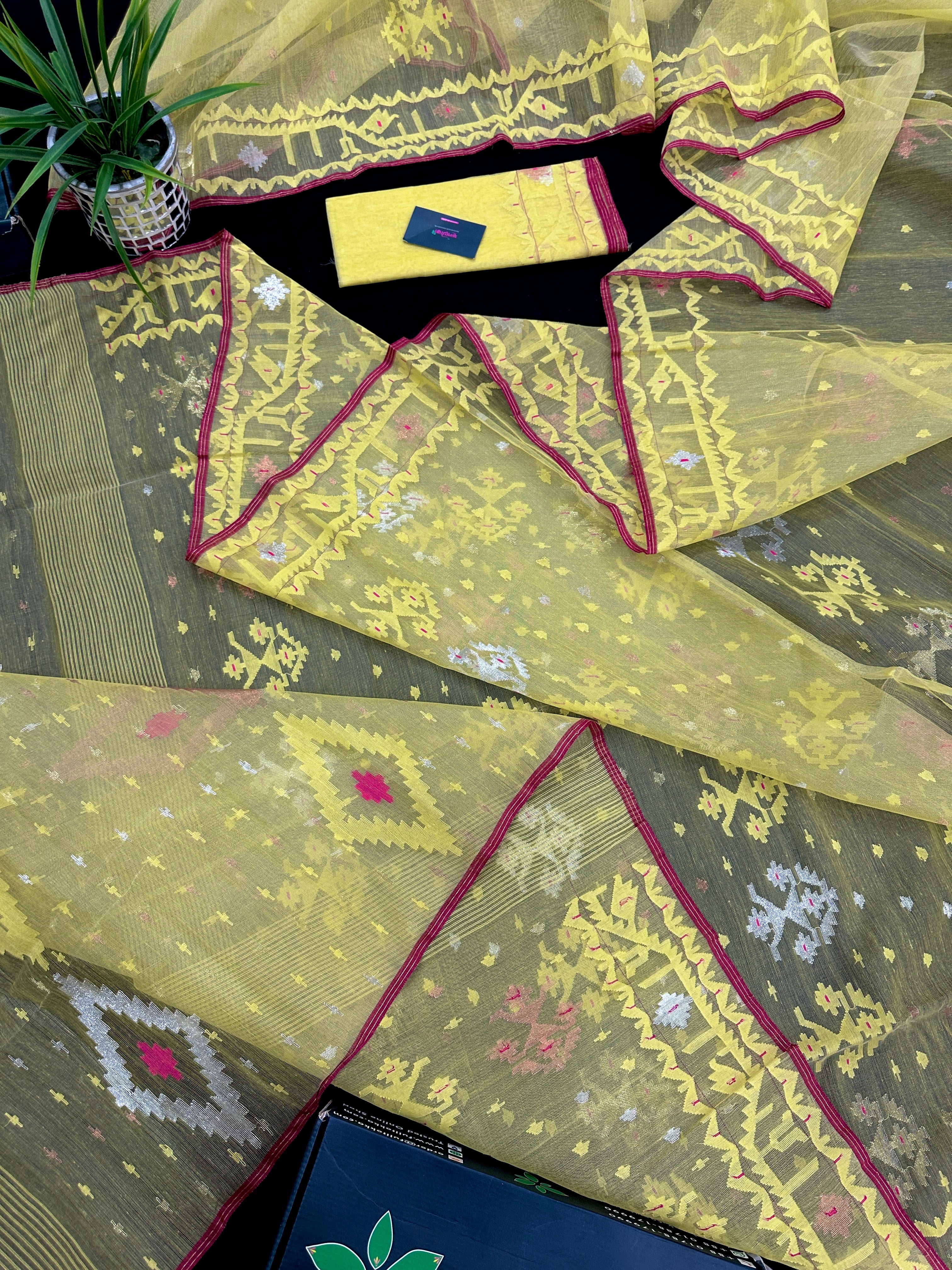Pastel yellow dhakai jamdani saree with yellow threads silver & copper jori work all over work soft count.