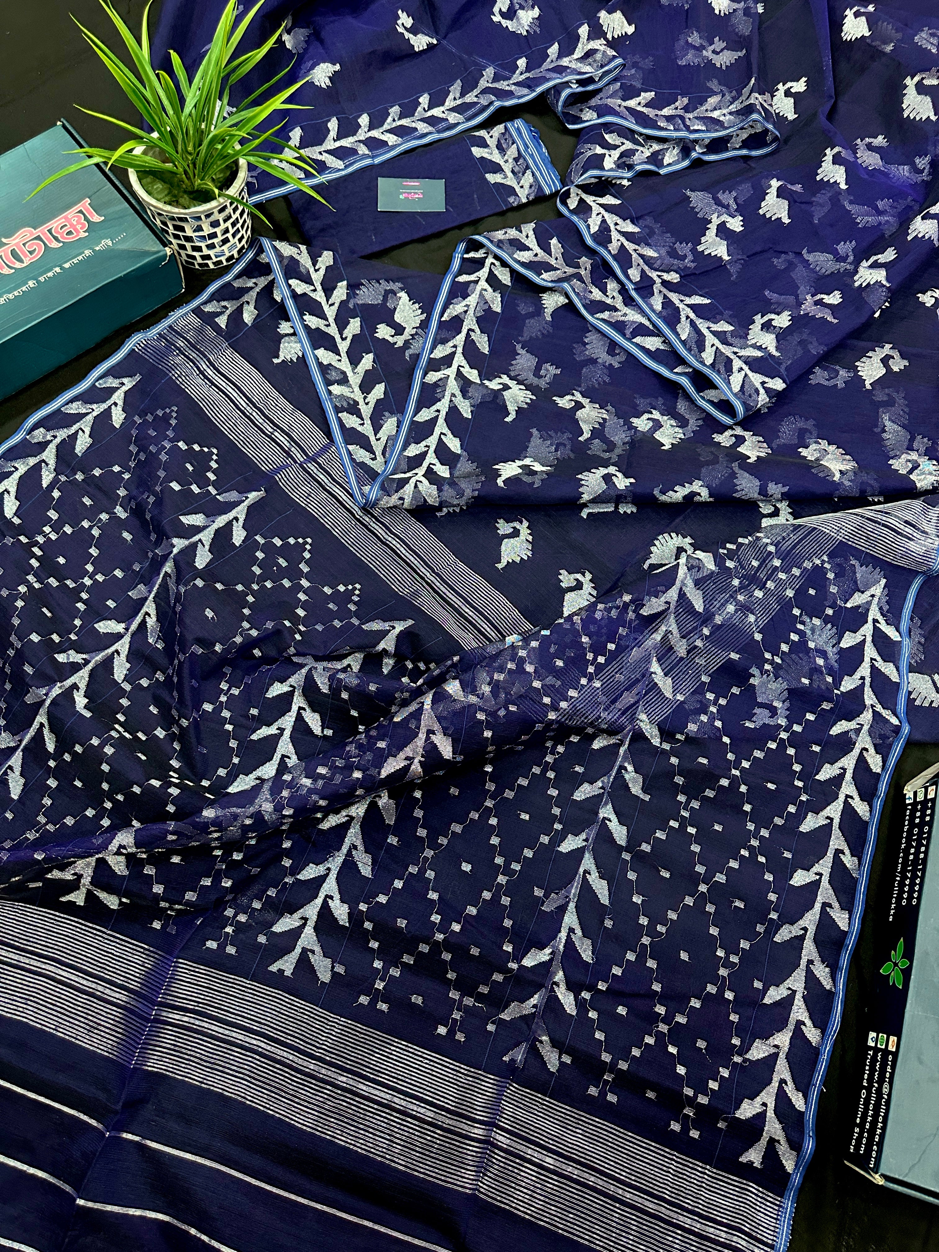 Navy blue jamdani saree with silver jori work soft threads all over work.