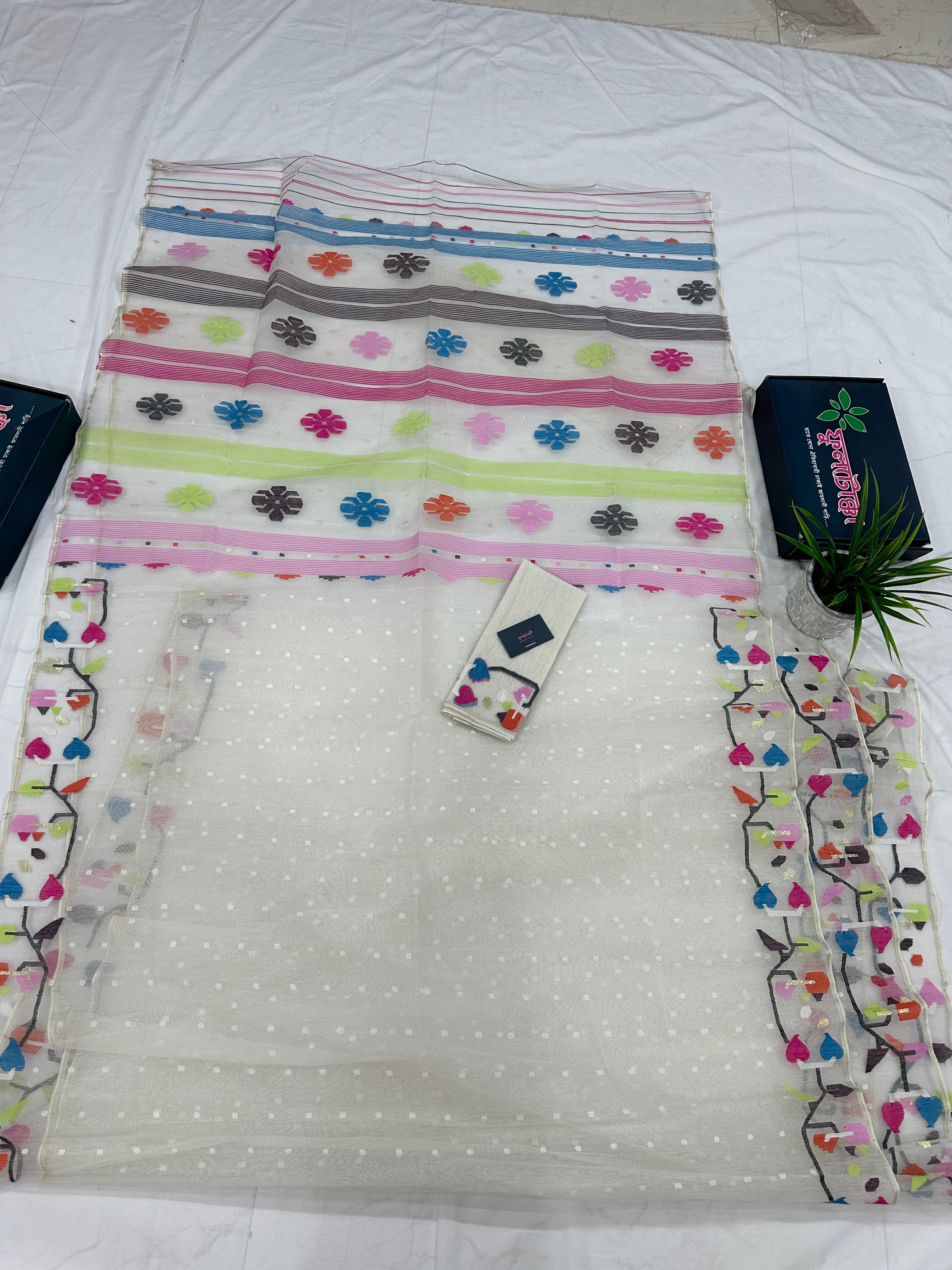 White Jamdani Saree With Multiple Threads Work.