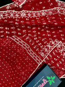 Maroon jamdani saree with white thread work.