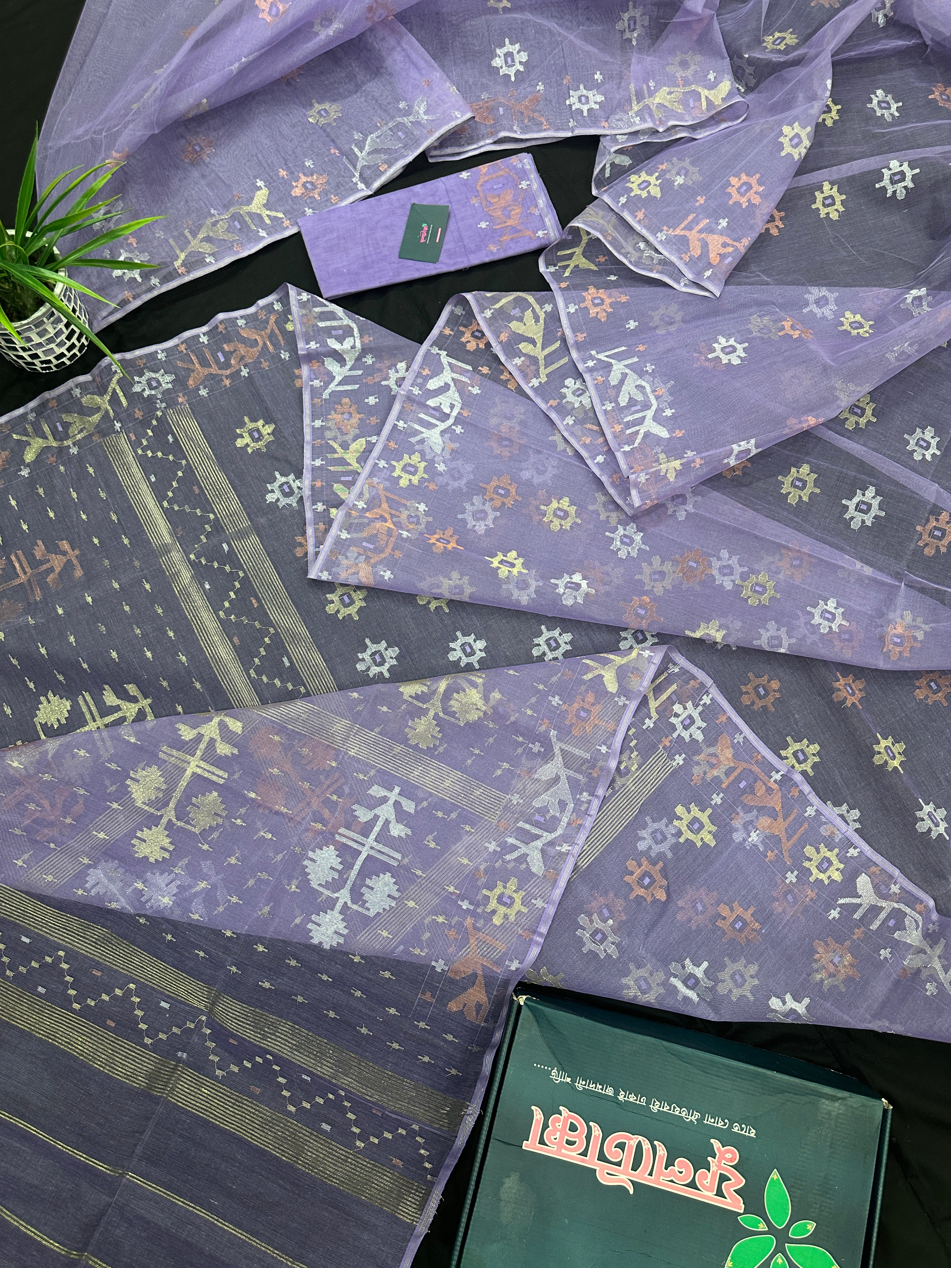 Lite lavender jamdani saree with golden silver copper jori work.