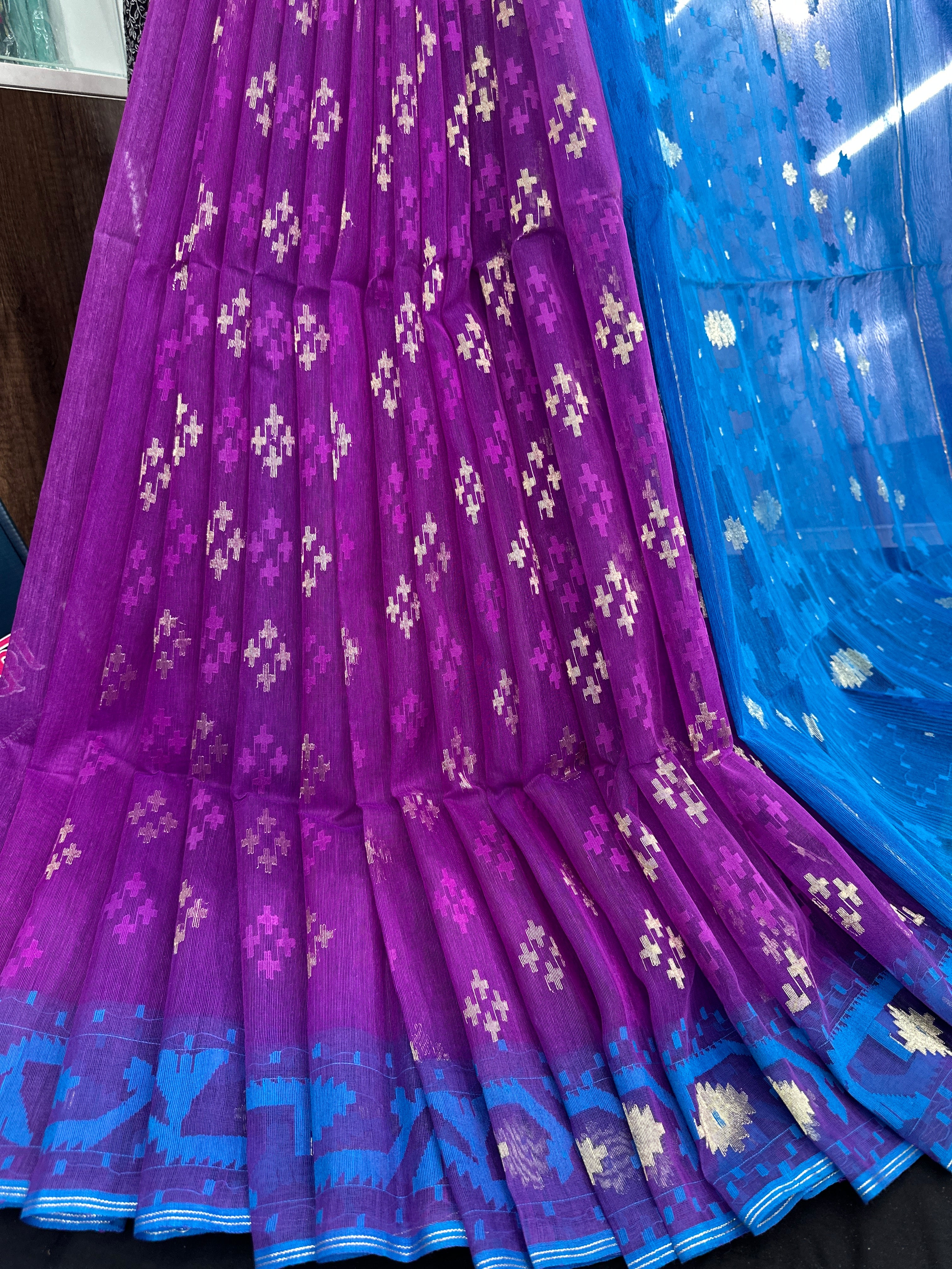 Purple halfsilk jamdani saree with golden jori work and contrast blue paar