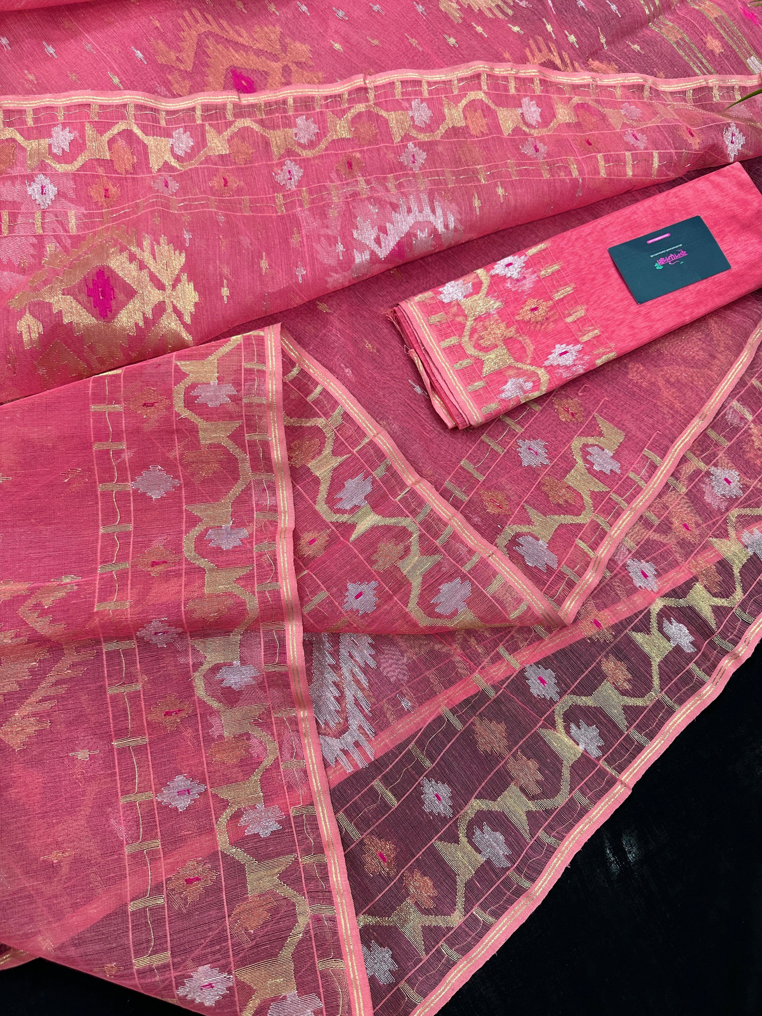 Peach pink jamdani saree with golden silver & copper jori work.