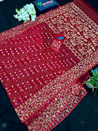 Reddish Maroon Bridal Exclusive dhakai jamdani saree with all over golden jori work soft count.