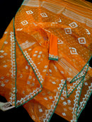 Orange soft jamdani saree with silver jori work & green border.