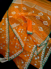 Orange soft jamdani saree with silver jori work & green border.