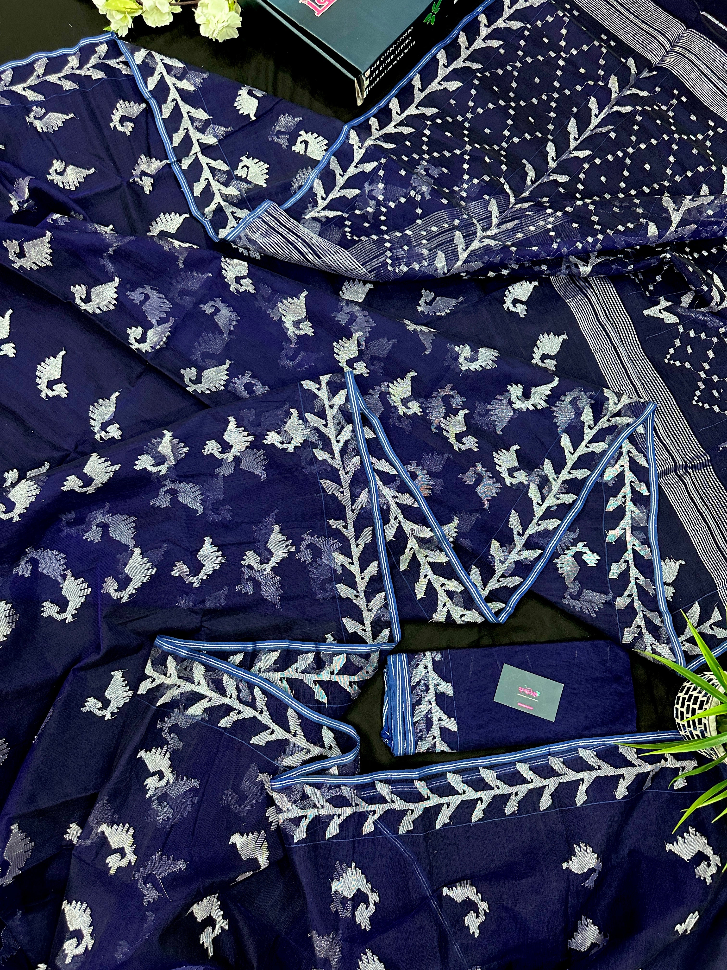 Navy blue jamdani saree with silver jori work soft threads all over work.