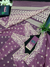 Onion cotton jamdani saree with yellowish threads work all over work.
