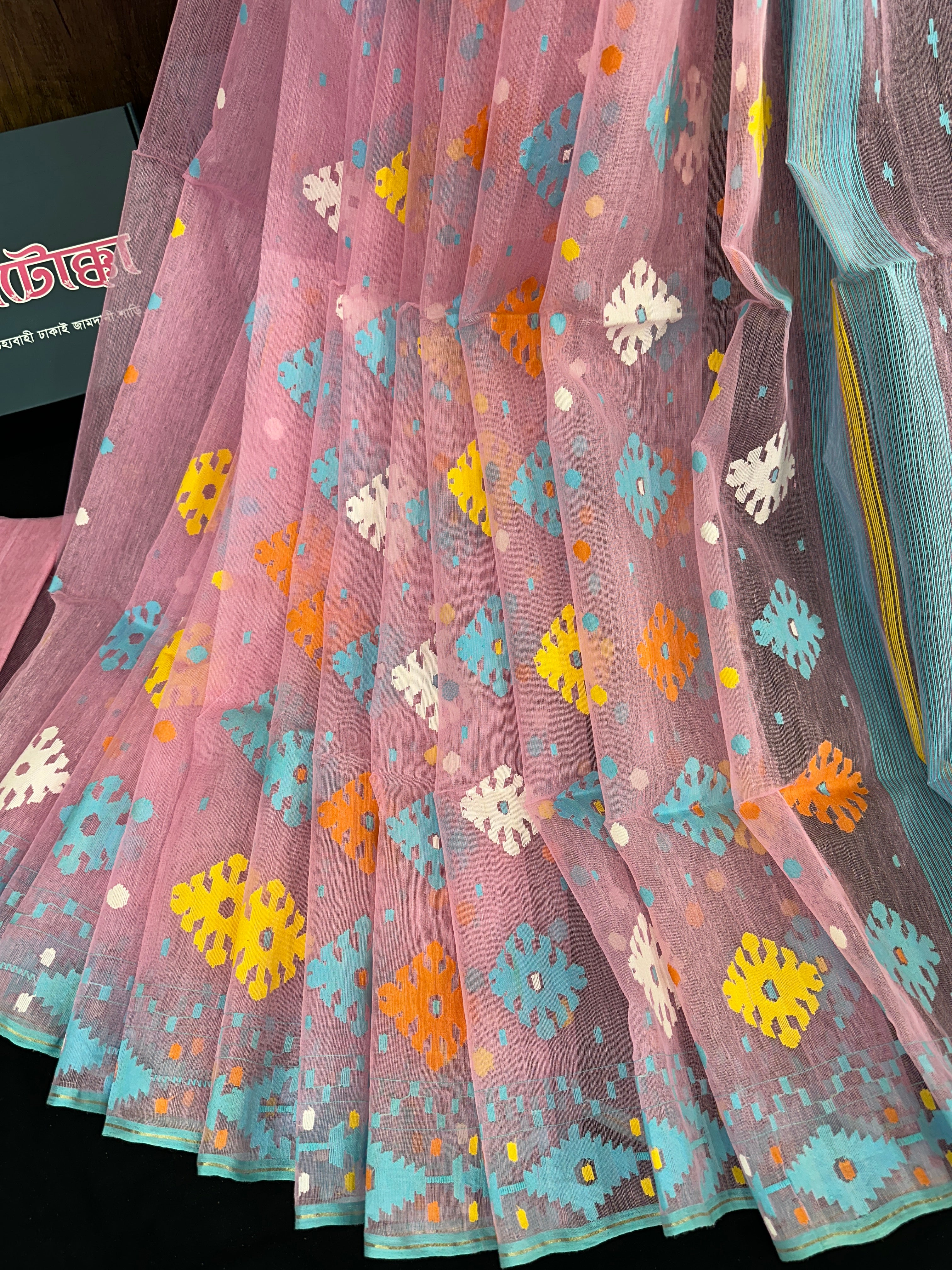 Pink jamdani saree with blue yellow white orange threads work