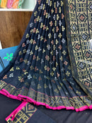 Black jamdani saree with golden silver and copper jori work and pink border