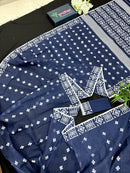 Deep blue jandani saree with white threads all over work.