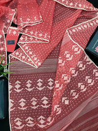 Sweet pink cotton jamdani saree with white threads work and blouse piece.