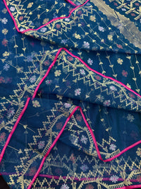 Peacock blue jamdani saree with golden silver copper jori work and pink border