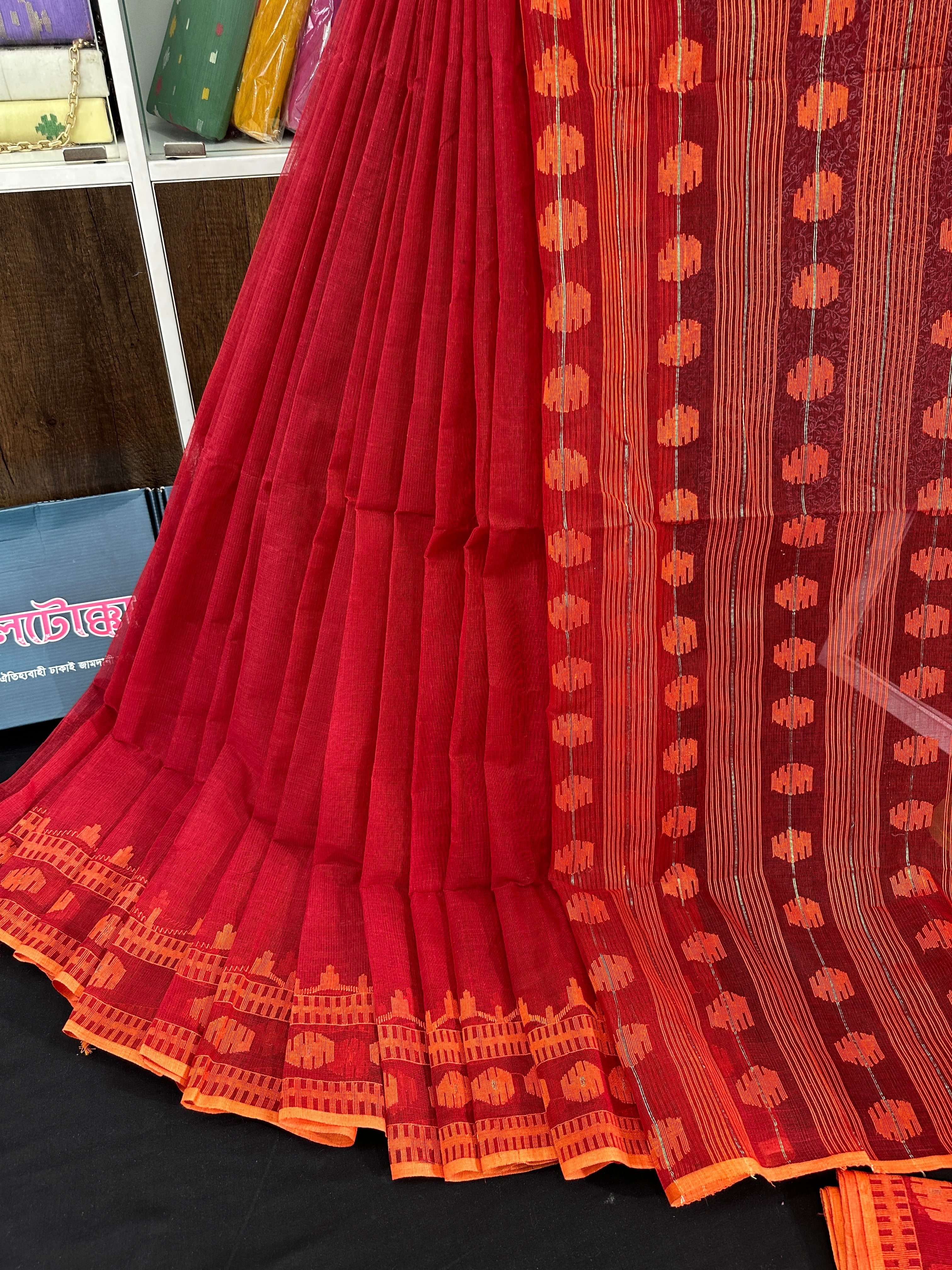 Red cotton jamdani saree with orange threads work