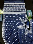 Deep blue jandani saree with white threads all over work.