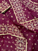 Maroon cotton jamdani with yellowish threads work.