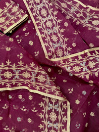 Maroon cotton jamdani with yellowish threads work.