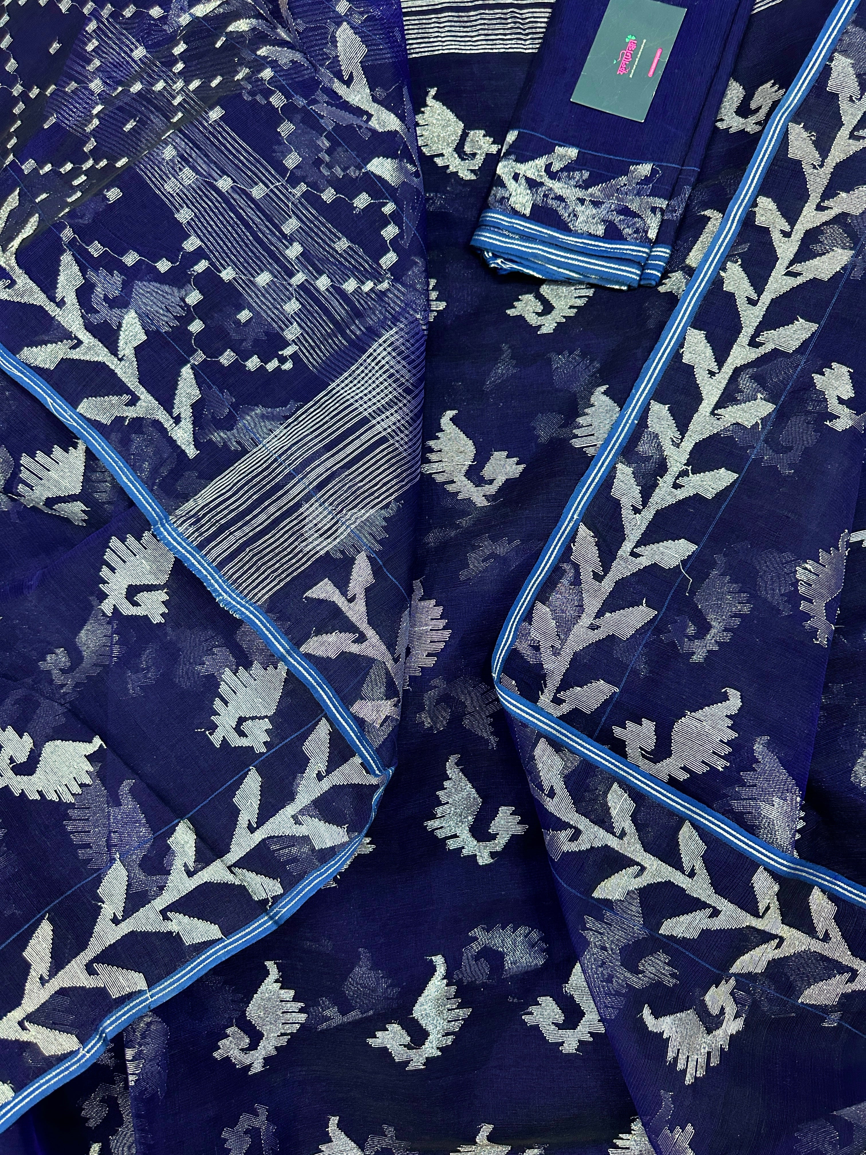 Navy blue jamdani saree with silver jori work soft threads all over work.