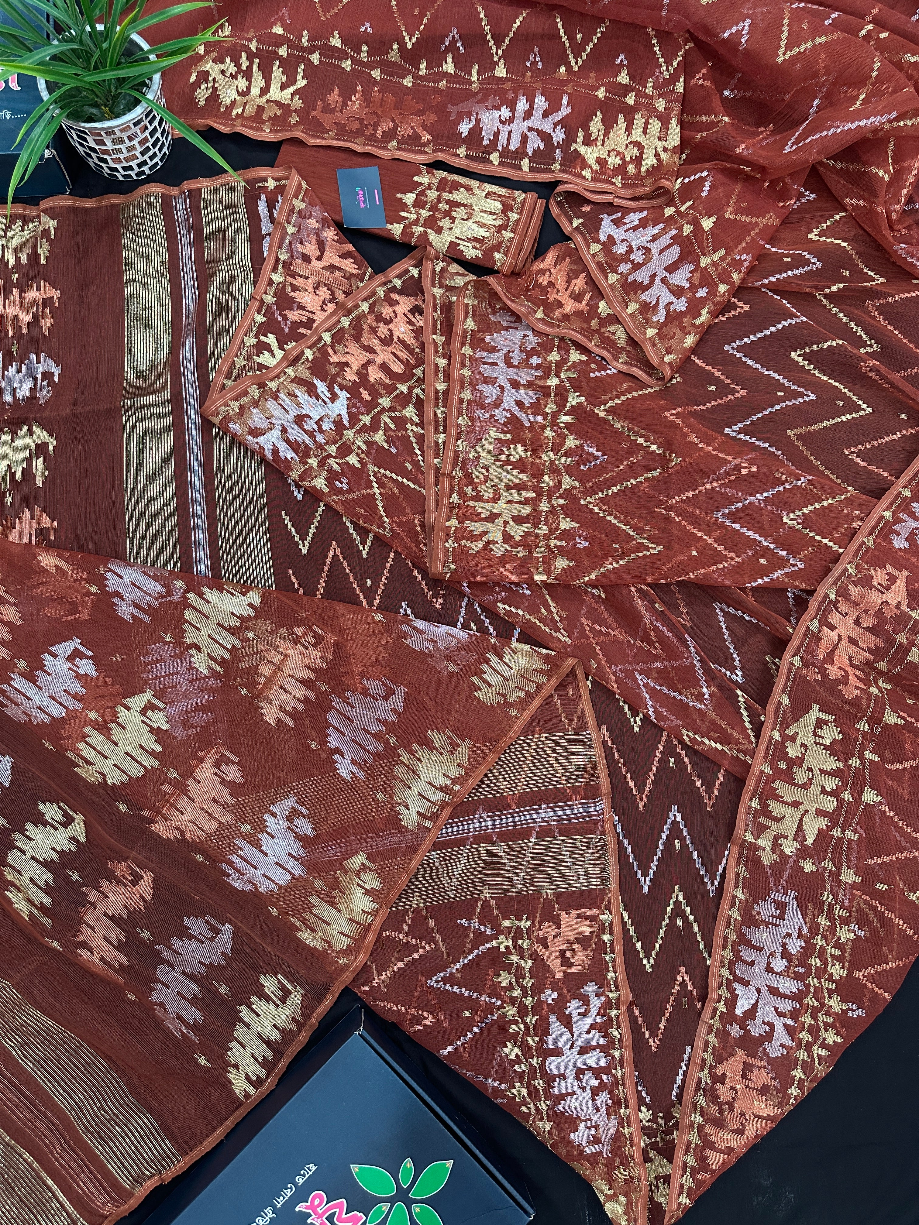 Brown reshom halfsilk jamdani saree with golden silver & copper jori work.