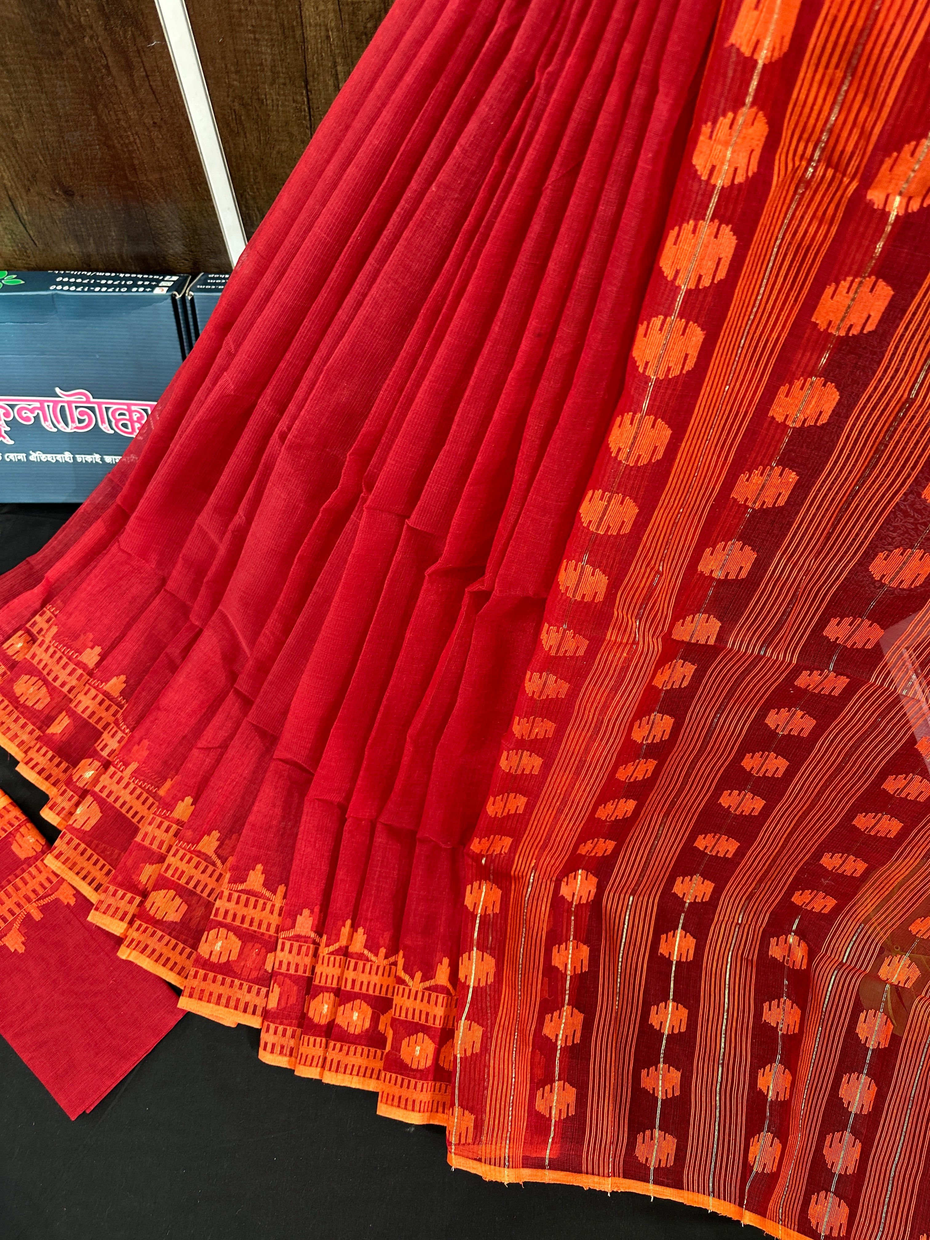 Red cotton jamdani saree with orange threads work
