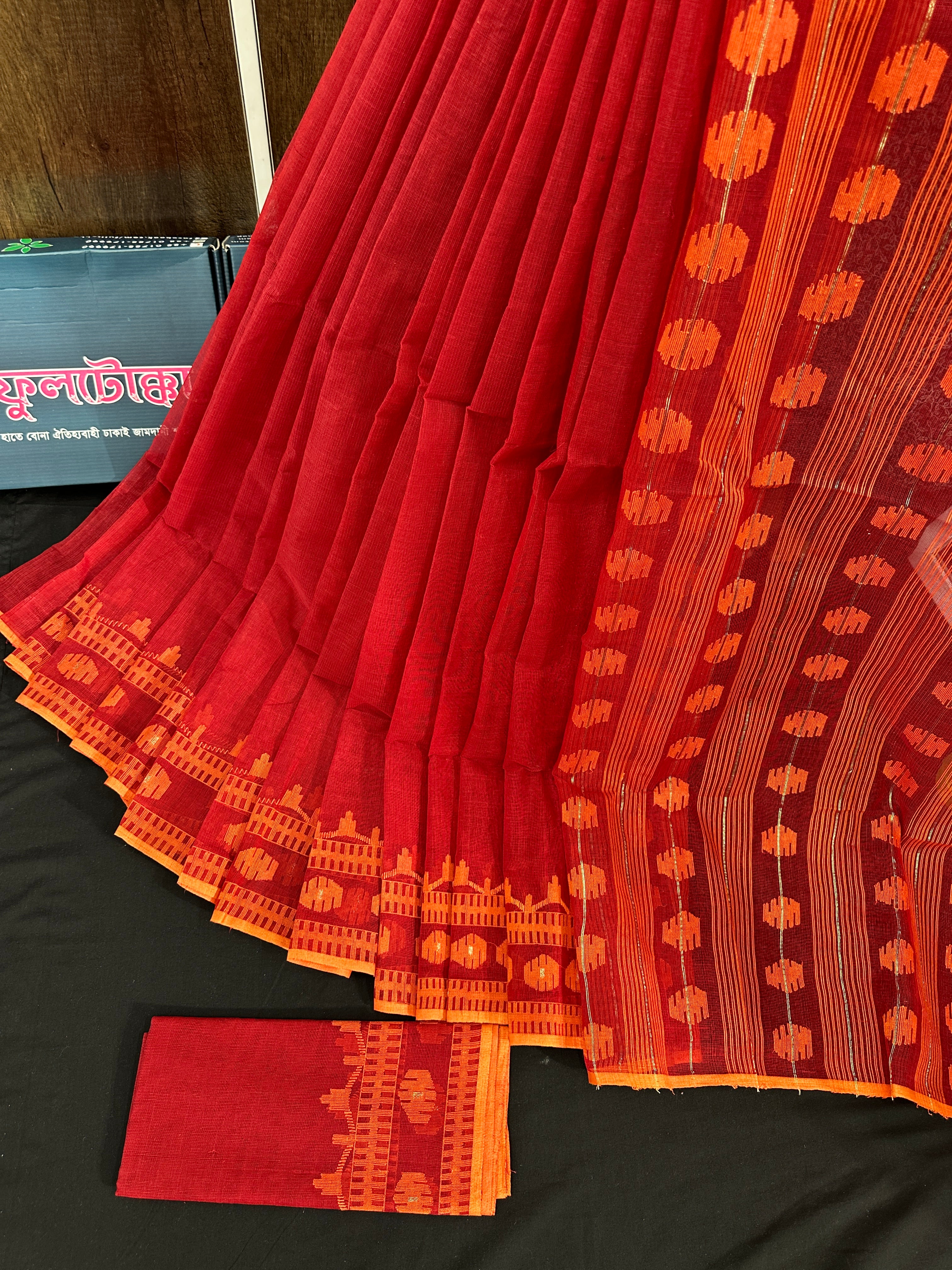 Red cotton jamdani saree with orange threads work
