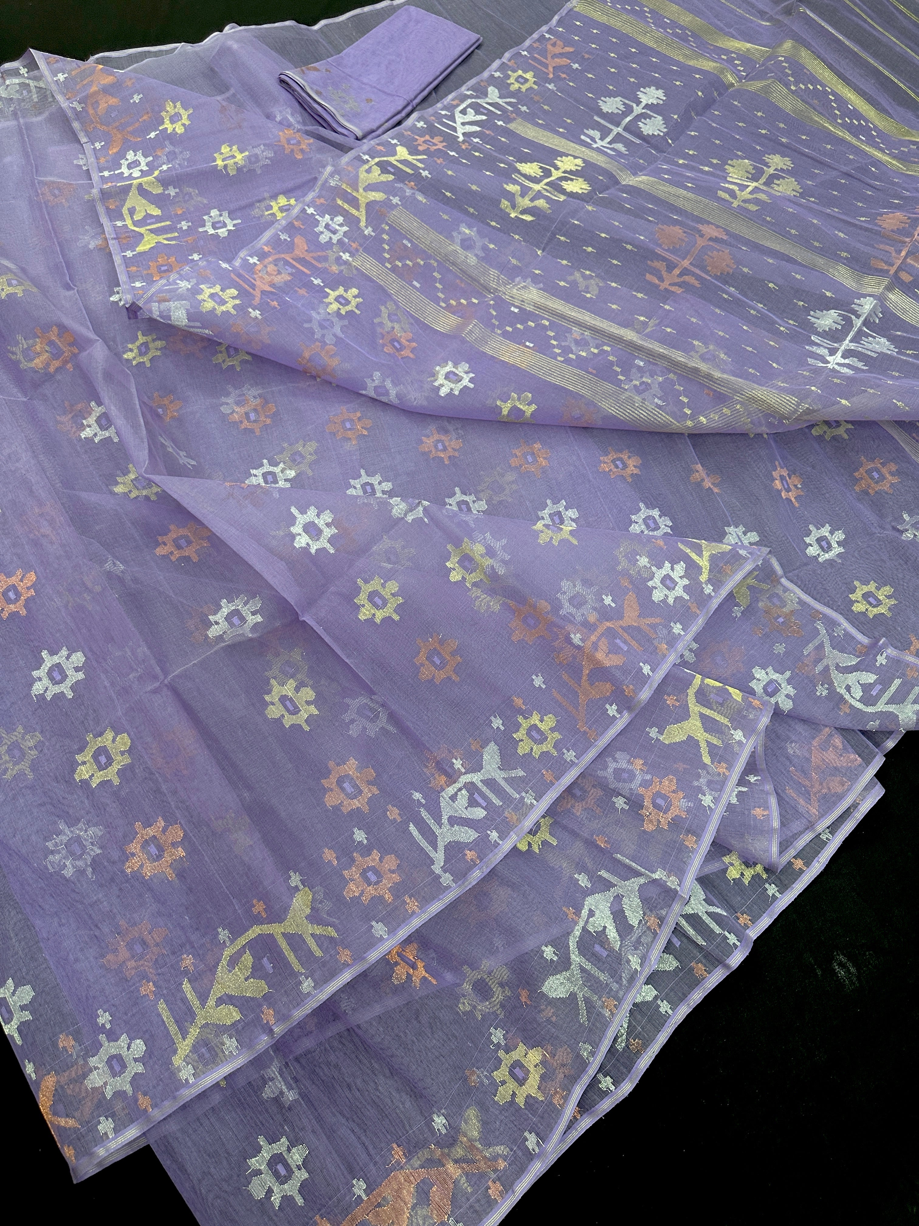 Lite lavender jamdani saree with golden silver copper jori work.