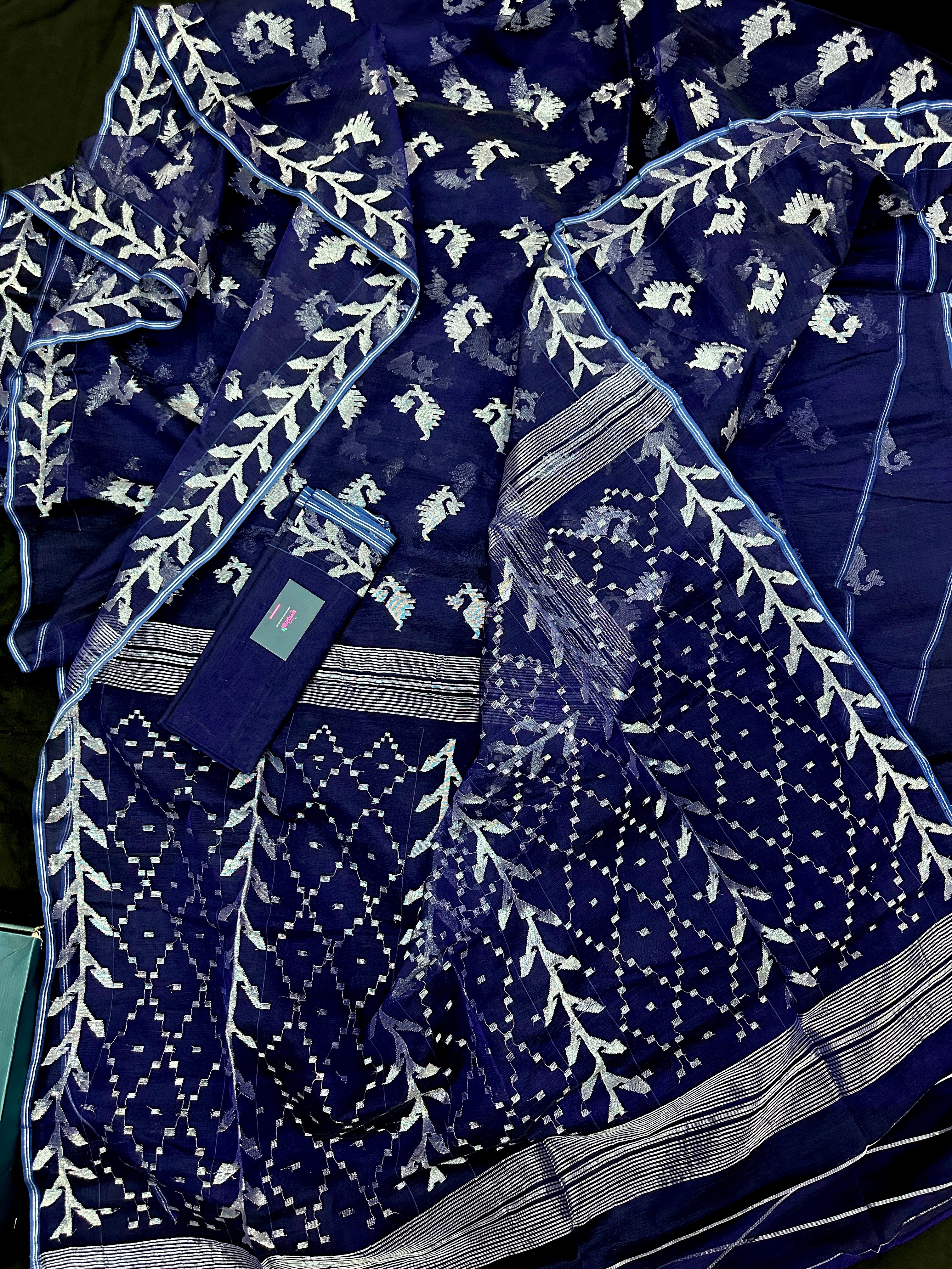 Navy blue jamdani saree with silver jori work soft threads all over work.