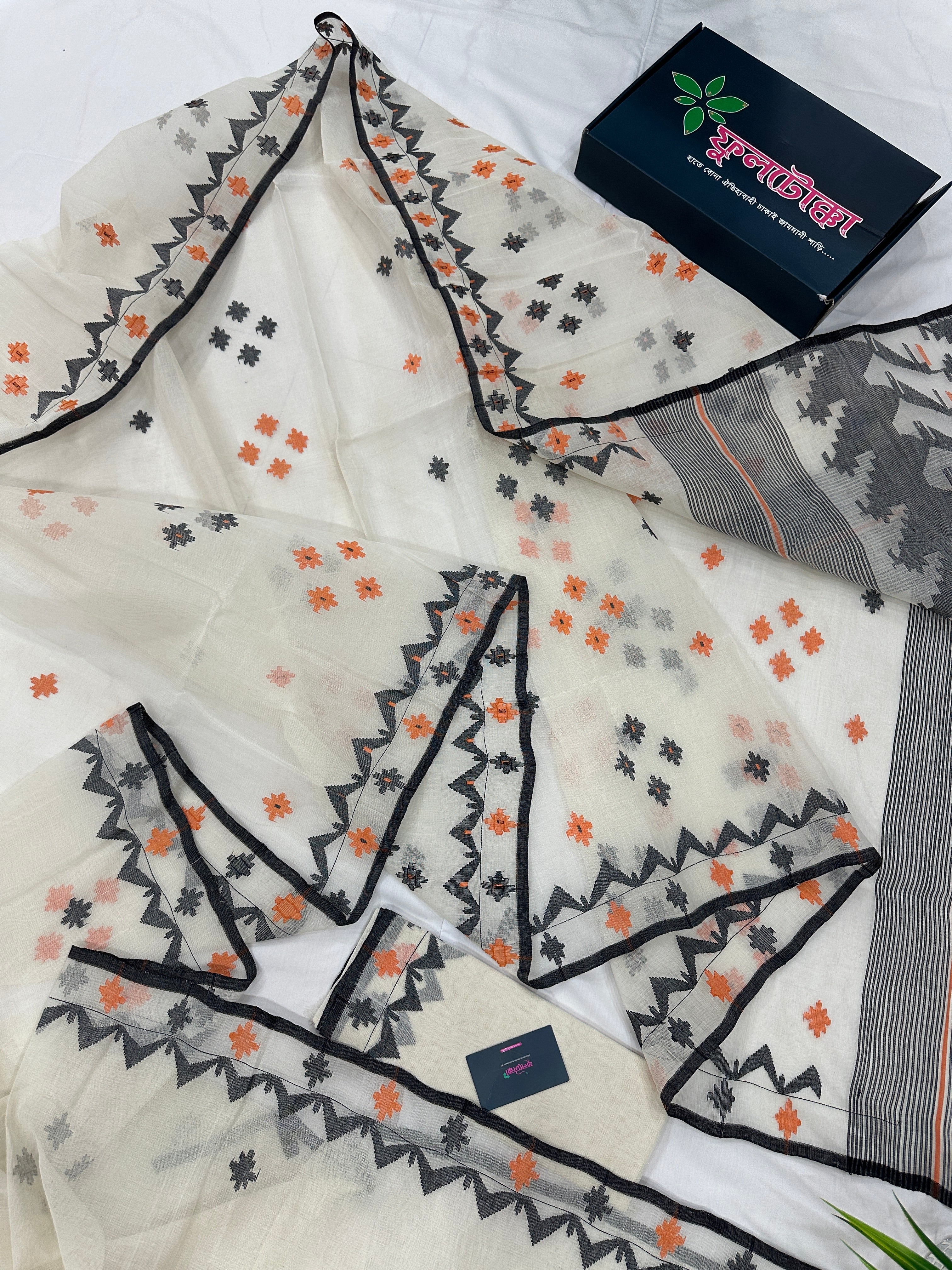 White cotton jamdani saree with orange & black threads work.