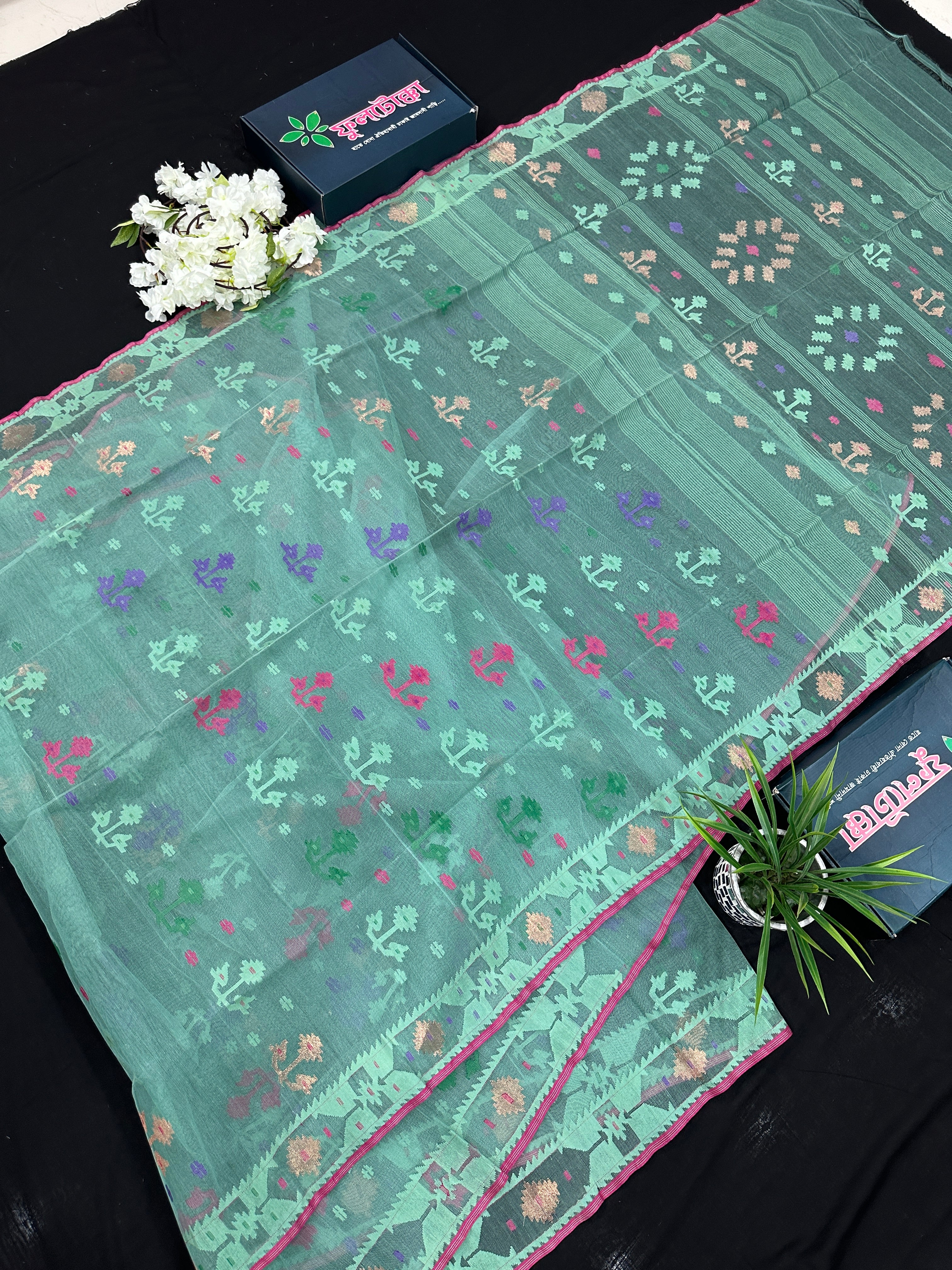 Bright Teal Blue dhakai Jamdani saree with pink border all over work soft count.