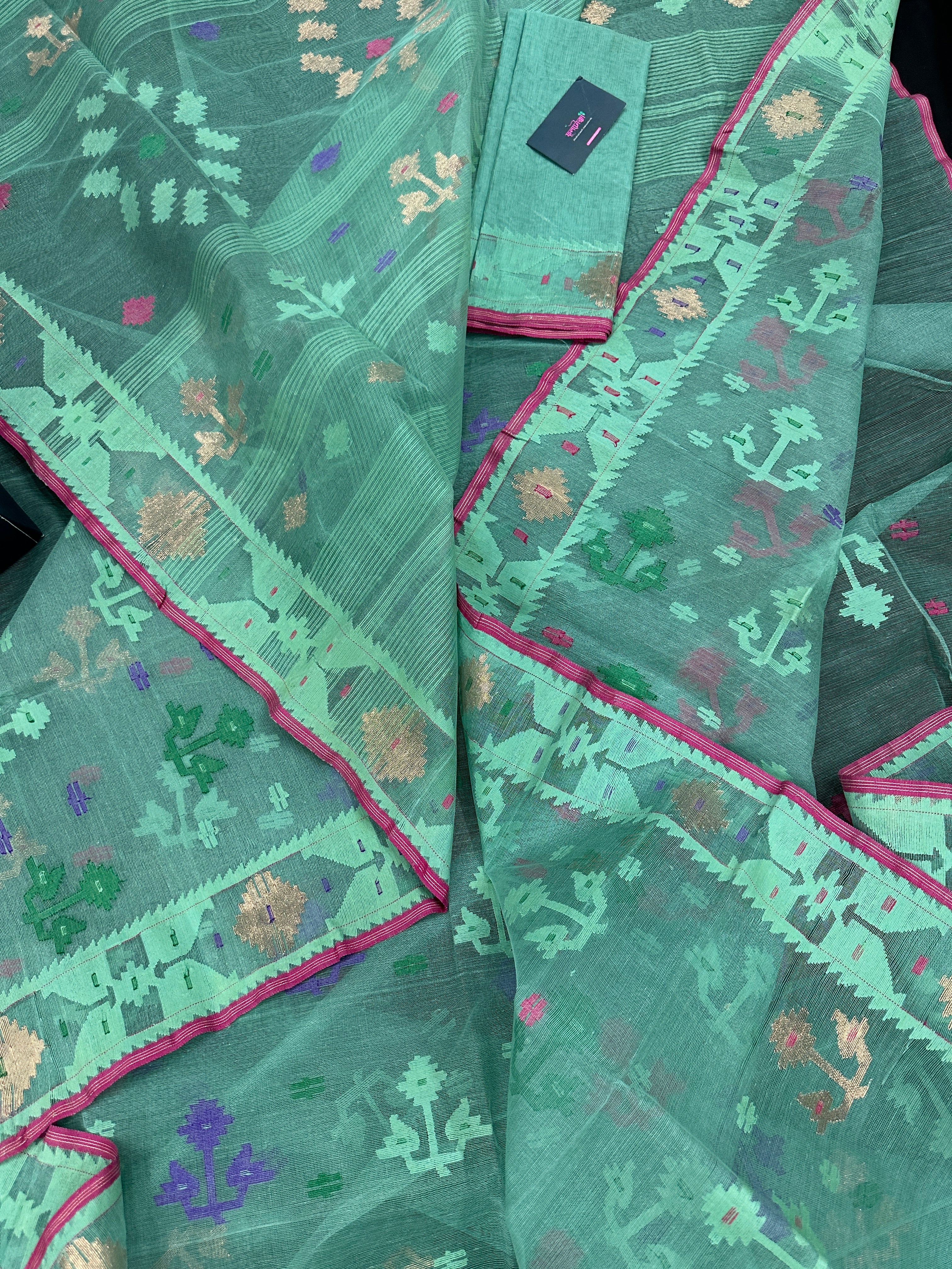 Bright Teal Blue dhakai Jamdani saree with pink border all over work soft count.