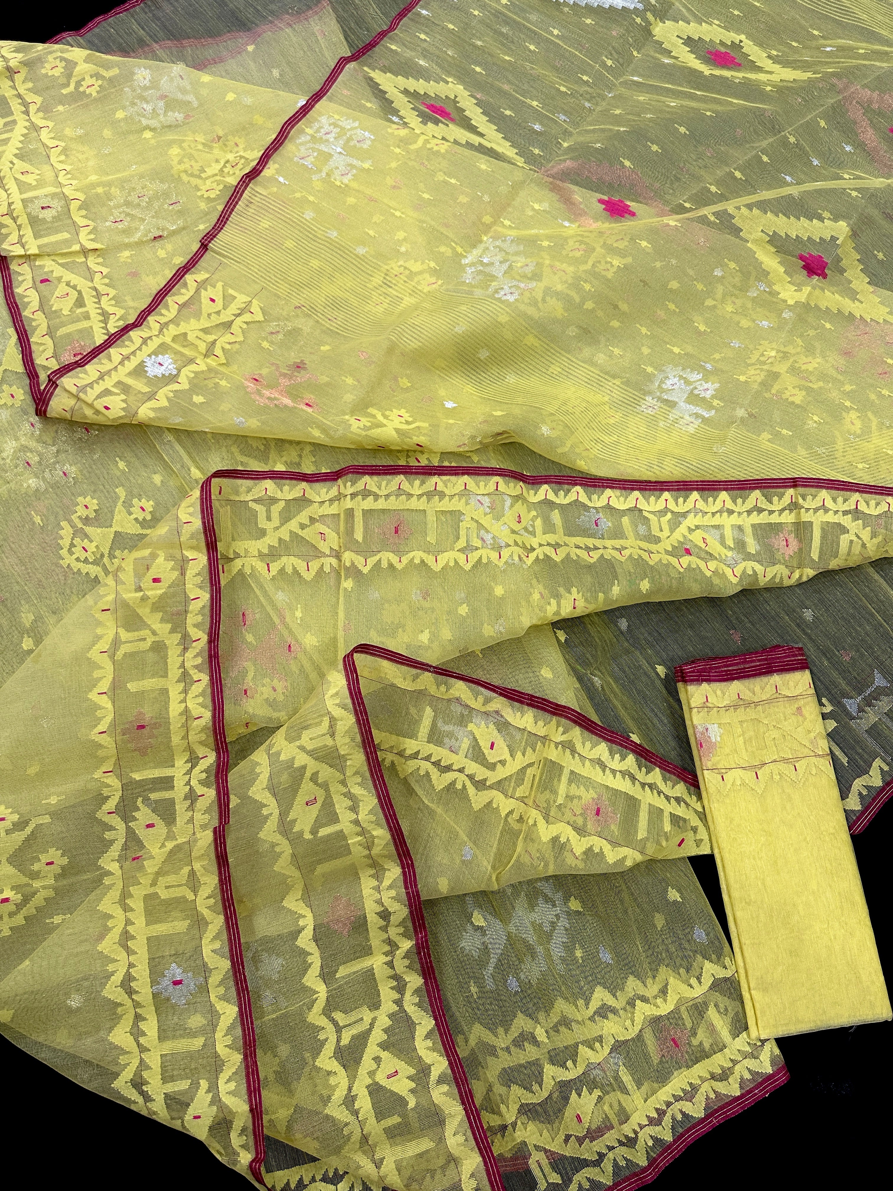 Pastel yellow dhakai jamdani saree with yellow threads silver & copper jori work all over work soft count.