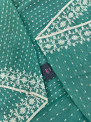 Mint cotton jamdani saree with white threads work all over work and blouse piece.