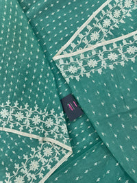 Mint cotton jamdani saree with white threads work all over work and blouse piece.