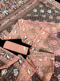 Creamy peach jamdani saree with pink white and peach threads work.
