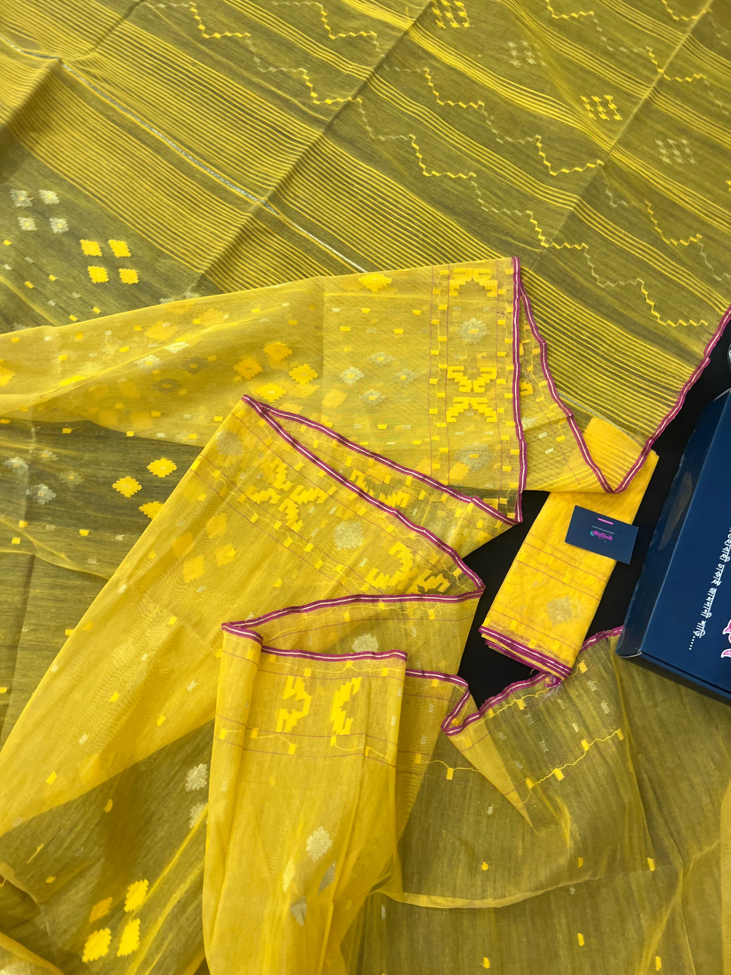 Yellow colour handloom halfsilk dhakai jamdani saree with pink border
