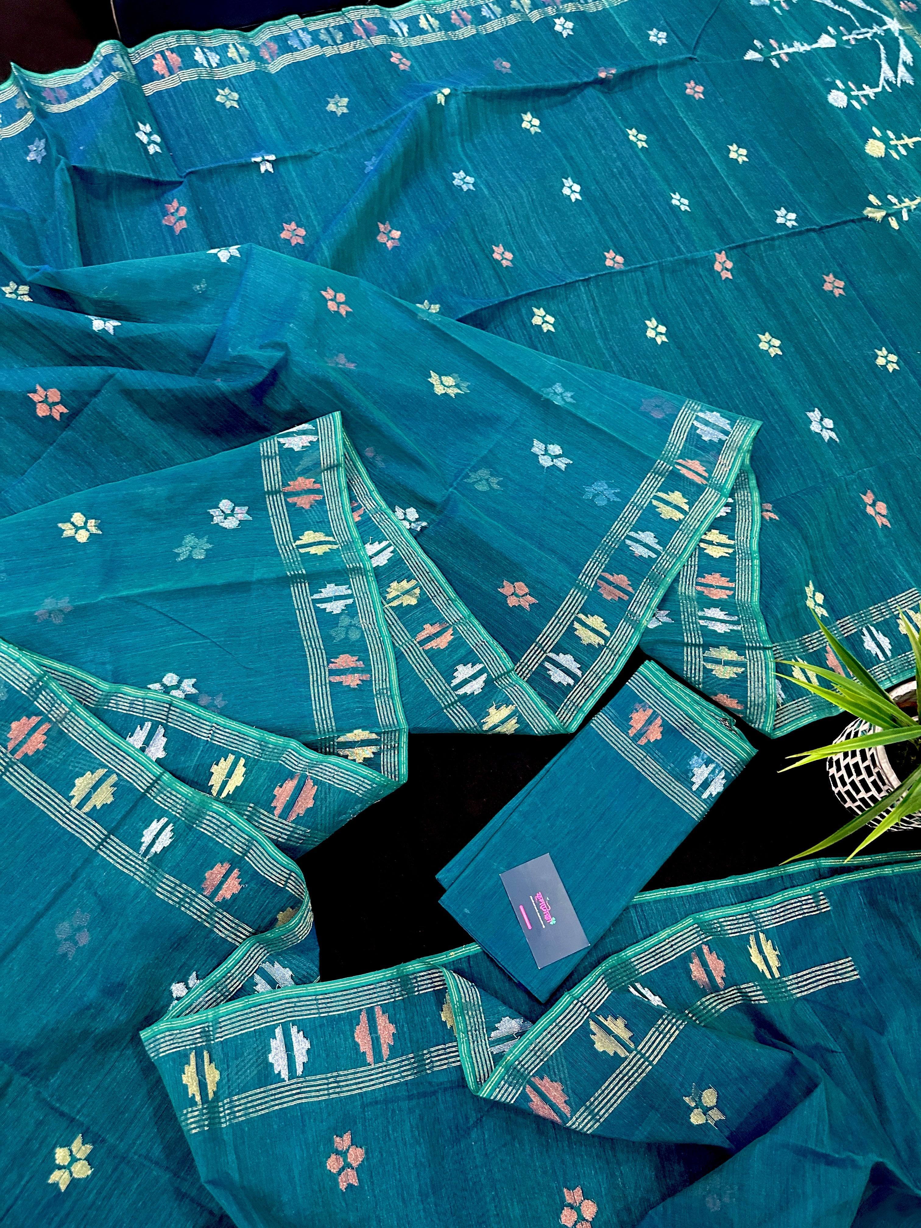 Sea green budget range jamdani saree with golden silver & copper jori work.