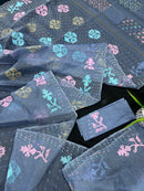 Powdery blue jamdani saree with pink blue and golden jori work.