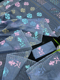 Powdery blue jamdani saree with pink blue and golden jori work.