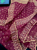 Maroon cotton jamdani with yellowish threads work.