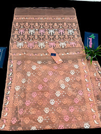 Creamy peach jamdani saree with pink white and peach threads work.