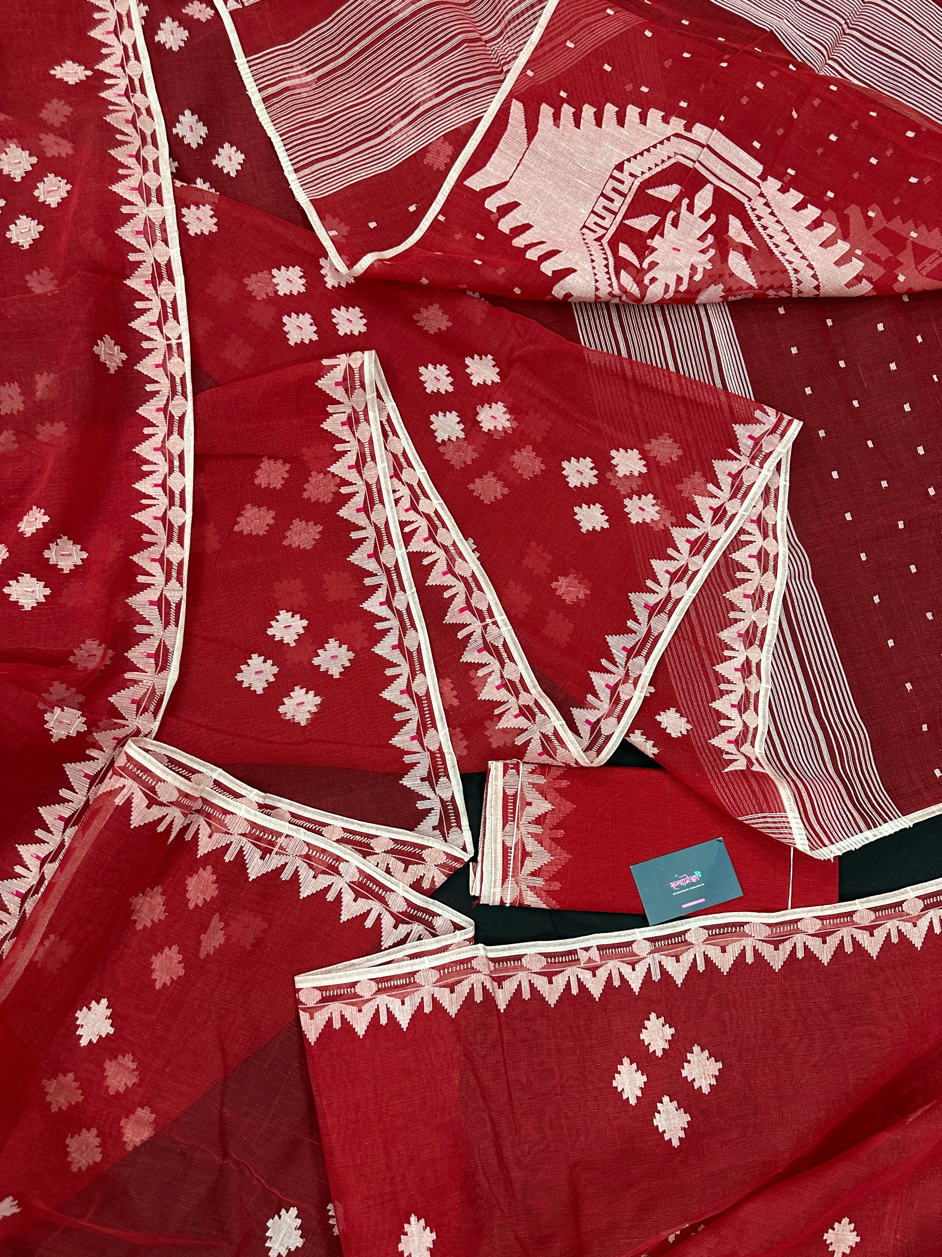 Radish Maroon cotton jamdani saree with white threads work all over work.