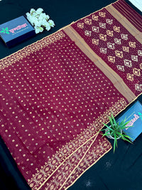 Maroon cotton jamdani with yellowish threads work.