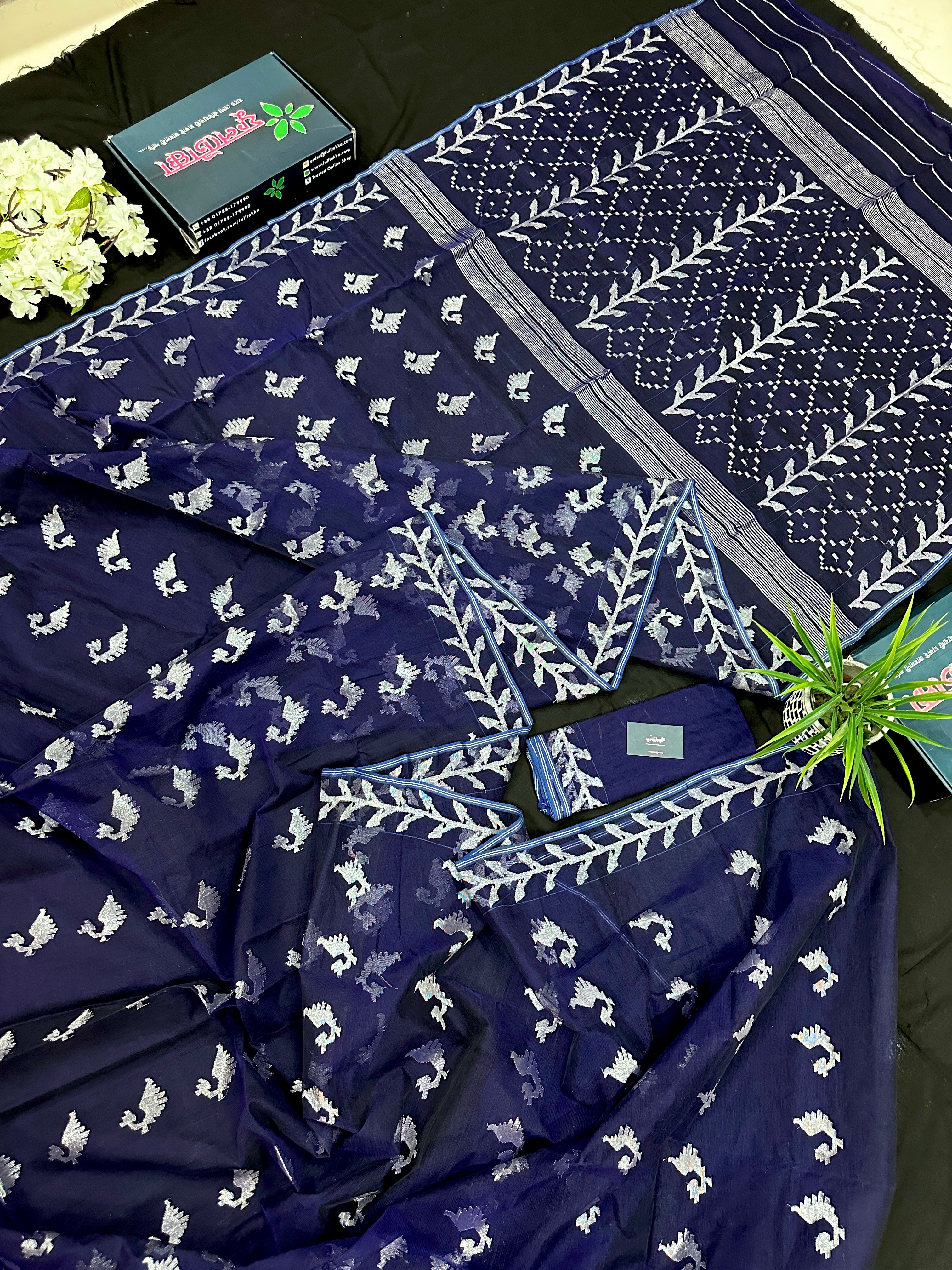 Navy blue jamdani saree with silver jori work soft threads all over work.