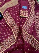 Maroon cotton jamdani with yellowish threads work.