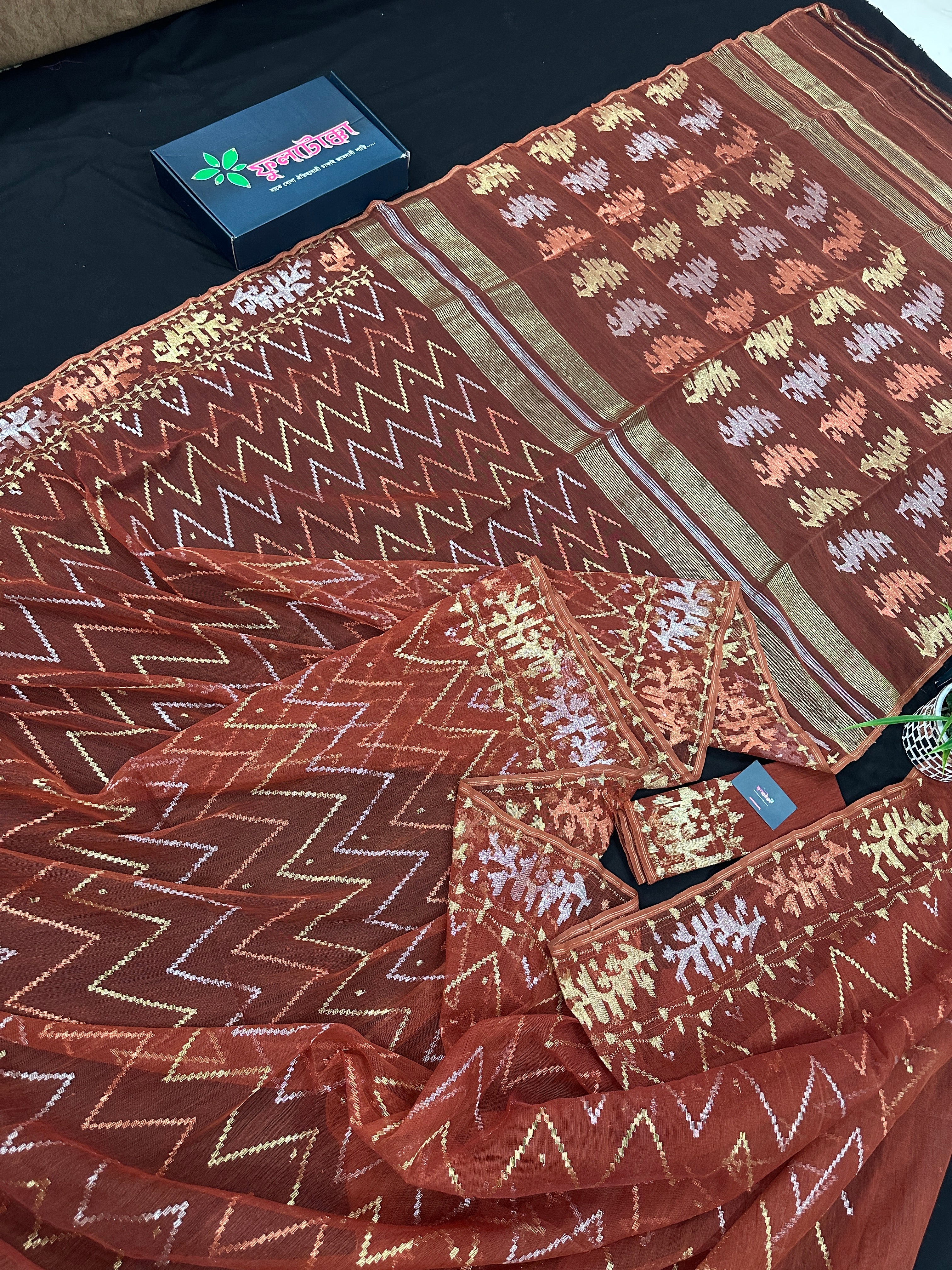 Brown reshom halfsilk jamdani saree with golden silver & copper jori work.