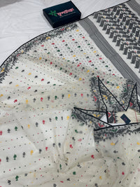 White cotton jamdani saree with black red yellow green threads work & blouse piece.