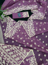 Onion cotton jamdani saree with yellowish threads work all over work.