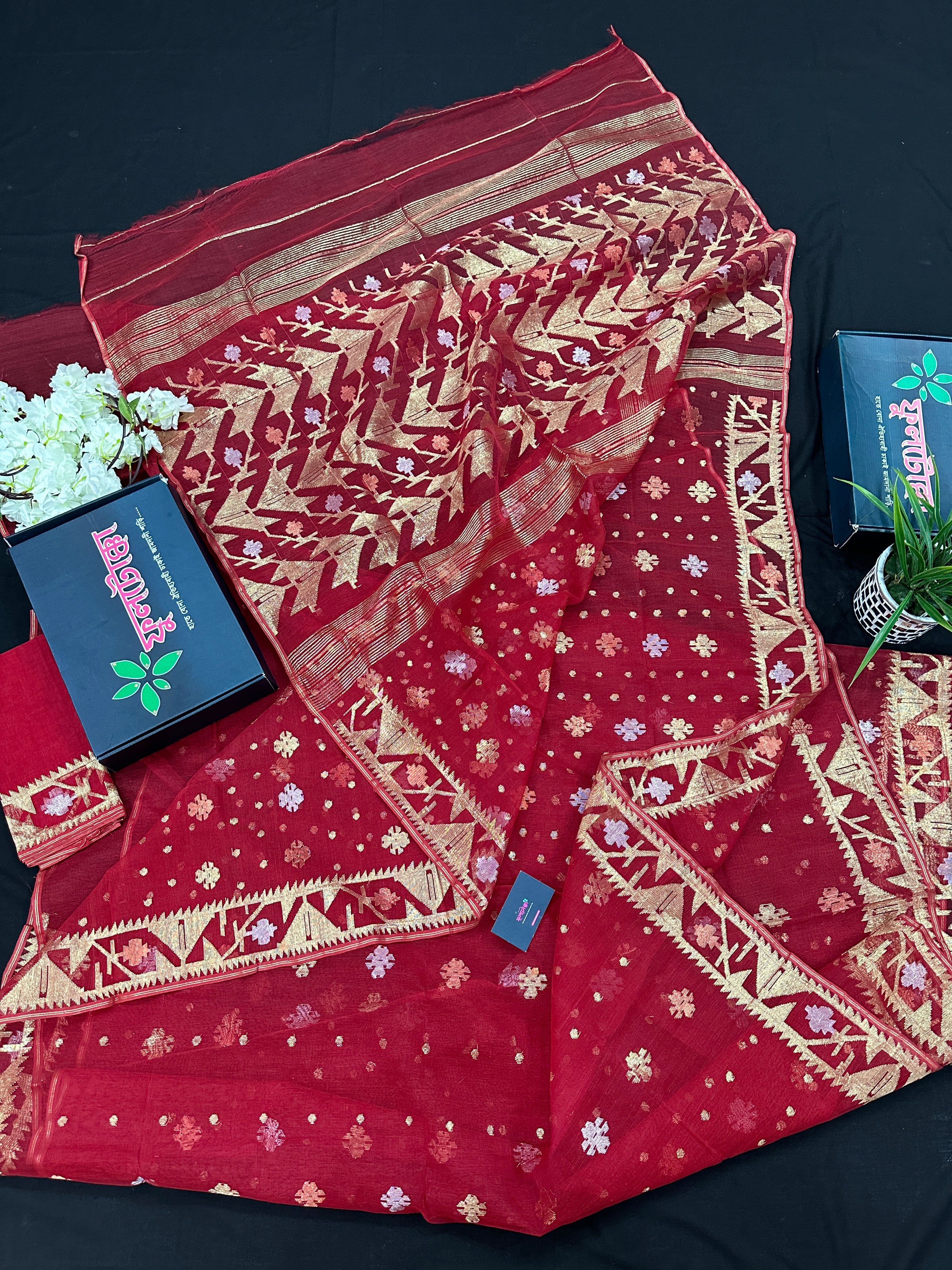 Red jamdani saree with golden jori all over work with blouse piece.
