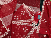 Radish Maroon cotton jamdani saree with white threads work all over work.