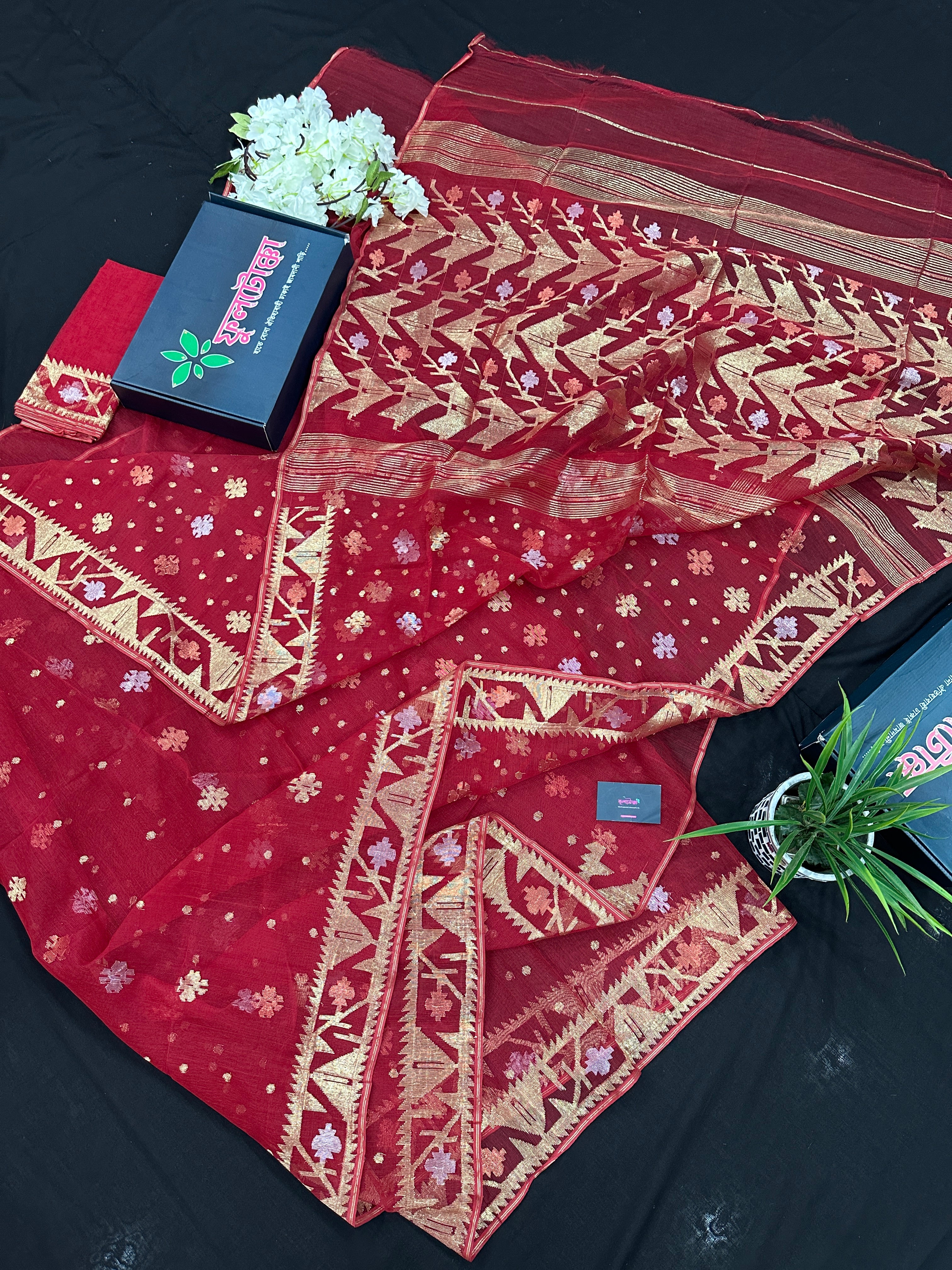 Red jamdani saree with golden jori all over work with blouse piece.